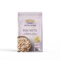 Resealable pouch of fox nuts with bowl, labeled high in antioxidants and nutrient-rich superfood